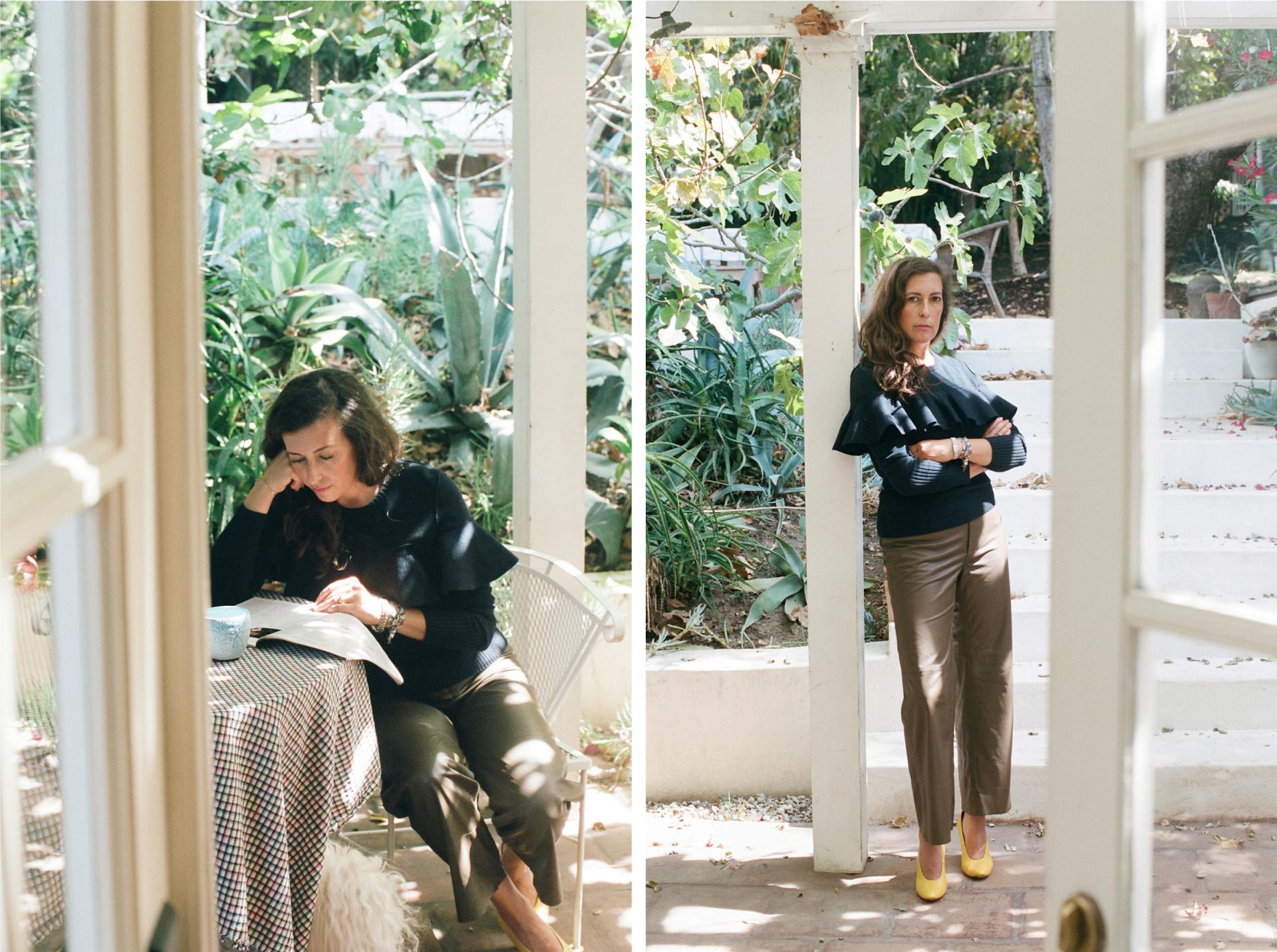 Two images of Clare Vivier wearing a dark outfit. In the first she is sitting down reading a book. In the second she is standing and leaning against a door.